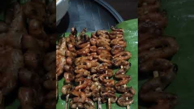 'filipino street food, chicken,isaw,isaw ng baboy and dugo ng baboy'