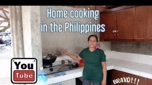 'PHILIPPINES:  SISTER IN LAW COOKS FILIPINO FOOD'