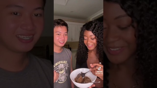 'trying Filipino food chicken adobo'