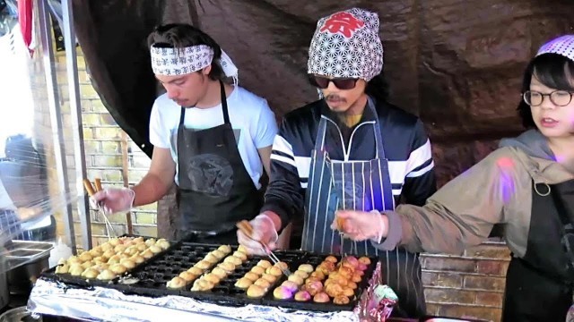 'London Street Food. Japanese Takoyaki Snack. Cooked in Brick Lane'