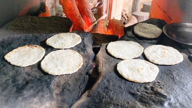 'sri lanka food - making ROTI on hot stone'