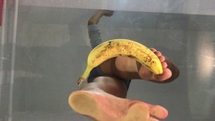 'Crushing banana under the glass barefoot! Do you like it?'