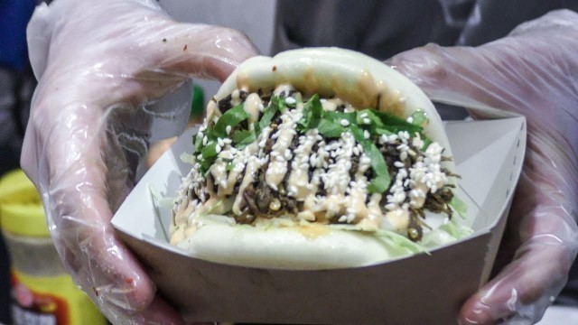 'The Chinese Filled Bun Eaten in London. Brick Lane Street Food'