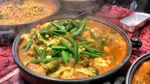 'London Street Food from Morocco. Couscous, Meat, Rice and More. Seen in Brick Lane'