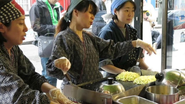 'London Street Food from Japan. Okonomiyaki and Onigiri Cooked and Tasted in Brick Lane'